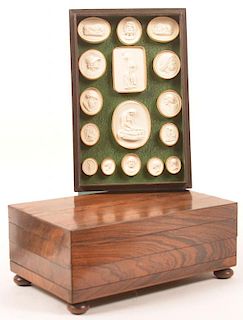 Rosewood Box Enclosing Plaster Medallions.