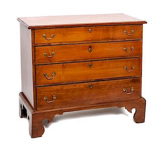 An American Cherry Chest of Drawers Height 33 1/2 x width 37 3/4 x depth 18 inches