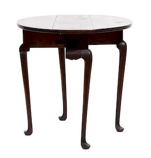 An American Mahogany Circular Drop-Leaf Table Height 26 1/2 x diameter 28 inches
