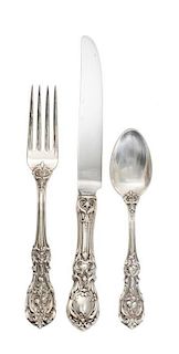 An American Silver Flatware Service, Reed & Barton, Taunton, Mass., comprising: 12 dinner knives 11 dinner forks 12 salad forks