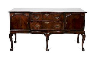 A Queen Anne Style Walnut Veneer and Mahogany Sideboard Height 35 1/2 x width 65 1/2 x depth 23 1/4