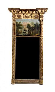 A Regency Gilt and Reverse Painted Glass Mirror Height 44 x width 22 1/2 inches
