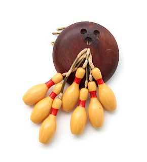 A Wood and Bakelite Bowling Themed Brooch Height 3 5/8 inches