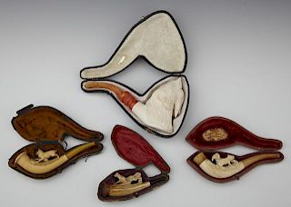 Group of Four Carved Meerschaum Pipes, 20th c., wi