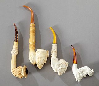 Group of Four Carved Meerschaum Pipes, 20th c. one