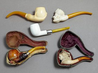 Group of Five Carved Meerschaum Pipes, 20th c., co