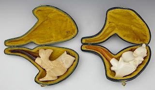 Two Carved Meerschaum Pipes, 20th c., of fish form
