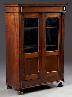 French Louis Philippe Carved Walnut Bookcase, late