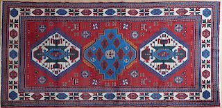 Semi-Antique Caucasian Kazak Carpet, 5' x 8'.