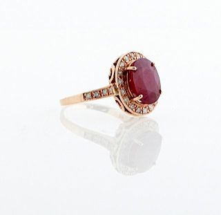 Lady's 14K Rose Gold Dinner Ring, with a 6.99 cara