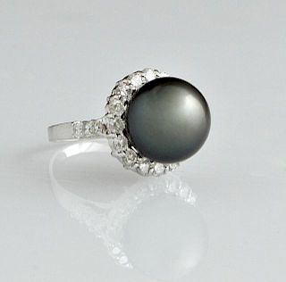 Lady's 14K White Gold Dinner Ring, with a 12 mm bl