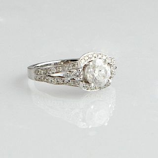 Lady's 14K White Gold Dinner Ring, with a round 1.