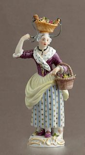 Meissen Porcelain Figure, 20th c., of a female flo