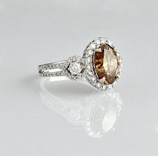 18K White Gold Lady's Dinner Ring, with an oval 2.