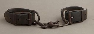 Pair of Leather and Iron Leg Shackles, 19th c., po