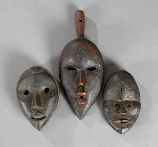 Group of Three African Carved Wood Masks, early 20