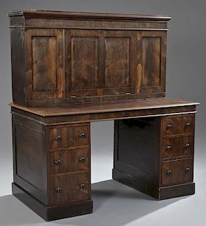 French Louis Philippe Style Carved Walnut Writing Table, early 20th c., the stepped shaped top over an arched skirt with a fr