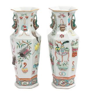 A Pair of Chinese Famille Rose Porcelain Vases Height 9 1/2 inches.
