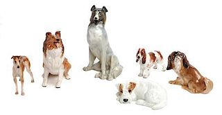 Six Royal Doulton Dog Figures Height of tallest 7 3/4 inches.