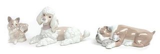 Three Lladro Porcelain Figures Width of widest 7 3/4 inches.