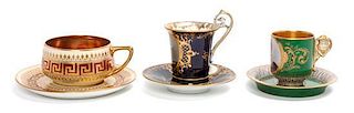* Three Continental Cabinet Cup and Saucer Sets Diameter of largest saucer 5 3/4 inches.