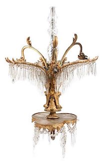 * A Continental Gilt Bronze Chandelier Height 43 inches.