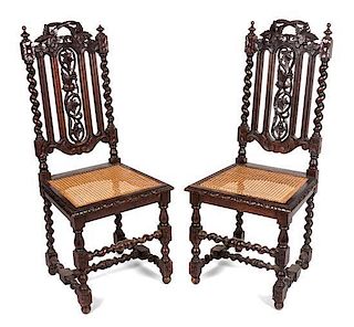 * A Pair of Renaissance Revival Carved Oak Side Chairs Height 41 inches.