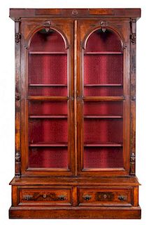 * A Victorian Walnut Bookcase Height 92 x width 56 1/2 x depth 21 inches.