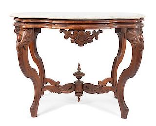 * A Victorian Walnut Parlor Table Height 27 x width 35 x depth 24 inches.