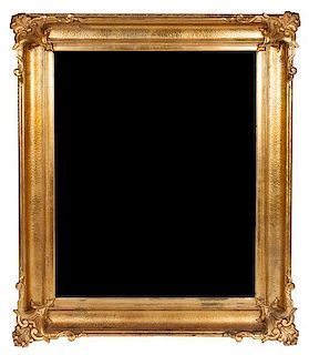 * A Victorian Giltwood Over Mantle Mirror 43 x 50 inches.