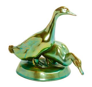 * A Zsolnay Iridescent Glazed Figural Group Height 7 inches.