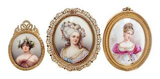 * Three Continental Porcelain Plaques Height of tallest overall 4 1/4 inches.
