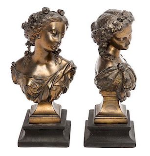* A Pair of Cast Metal Busts Height 10 1/4 inches.