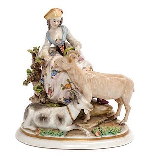 * A Continental Porcelain Figural Group Height 7 1/4 inches.