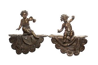 * A Pair of Cast Metal Figural Ornaments Height 11 3/4 inches.