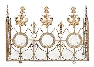 * A Neoclassical Gilt Metal and Molded Glass Three-Panel Fire Screen Width of central panel 32 inches.