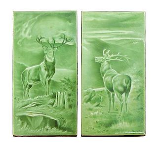 * A Collection of Four Pottery Tiles Height of first pair 12 inches.