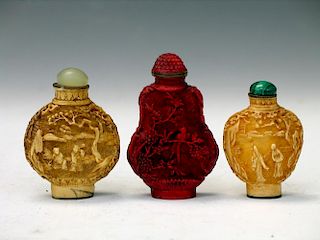 Three Chinese Cinnabar Snuff Bottles