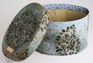 19th c Hannah Davis (1784-1863) wallpapered band box with label “warranted nailed band-boxes made by
