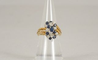 Ladies Diamond and Blue Gemstone Cluster Ring.