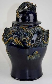 Chinese Shiwan stoneware dragon lidded jar, ht 13”
