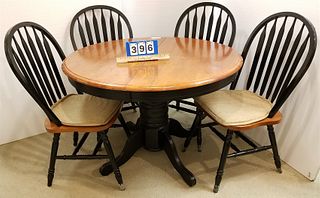 PED. BASE TABLE 42"DIAM. W. INTERIOR LEAF AND 4 CHAIRS
