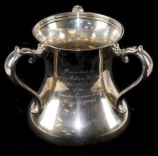Tiffany & Co 4 pint sterling silver three handle loving cup. Flared base and lip, interior banded ri