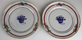 pr of 18th c Chinese export dinner plates- descending from John Jacob Astor VI, one with edge chips,