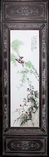 20th c Chinese painted porcelain wall plaque in carved wooden frame, overall 48” x 14”, panel 29” x