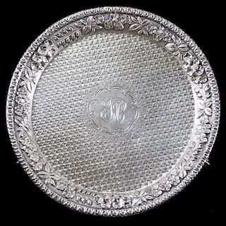 S. Kirk & Son (1868-1896) sterling silver footed salver. Diapered center, chased floral border, thre