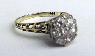 Ca 1890 10k y.g. ladies cocktail diamond ring having 7 small round cut diamonds approx. .05ct each.