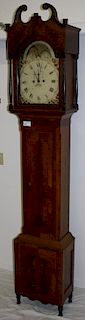 Pennsylvania Sheraton tall case clock with banded mahogany arch broken top, painted iron dial, ship