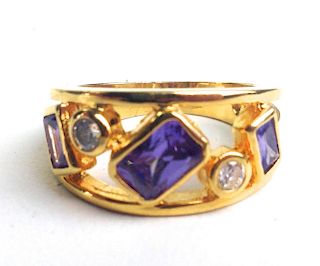 14k y.g. ring having 3 amethyst baguette cut stones and 2 .1ct round cut diamonds. Ring size 8.