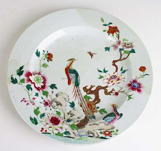 18th c  Chinese export porcelain charger with polychrome bird and floral decoration, extensive old r